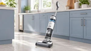 Tineco iFloor 3 wet-dry cleaner on a pale tiled kitchen floor